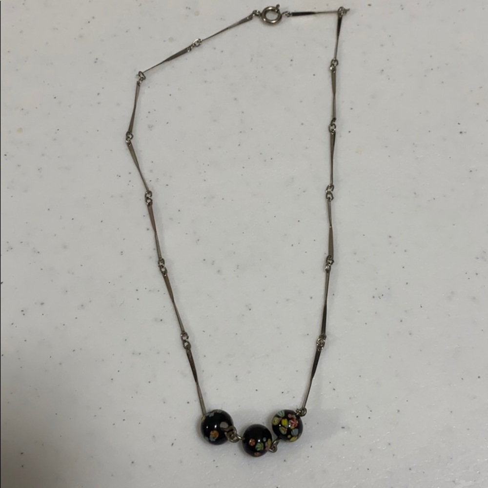 Necklace with three decorative balls